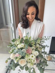 a happy bride with flowers